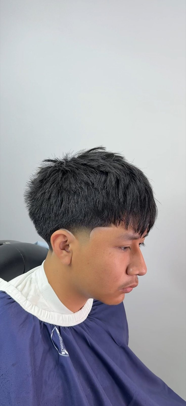 Textured crop with a low taper fade
